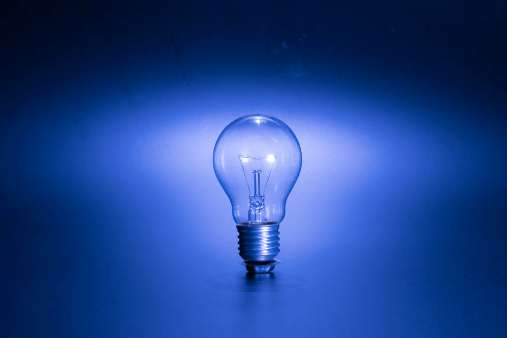 Light bulb on a blue background